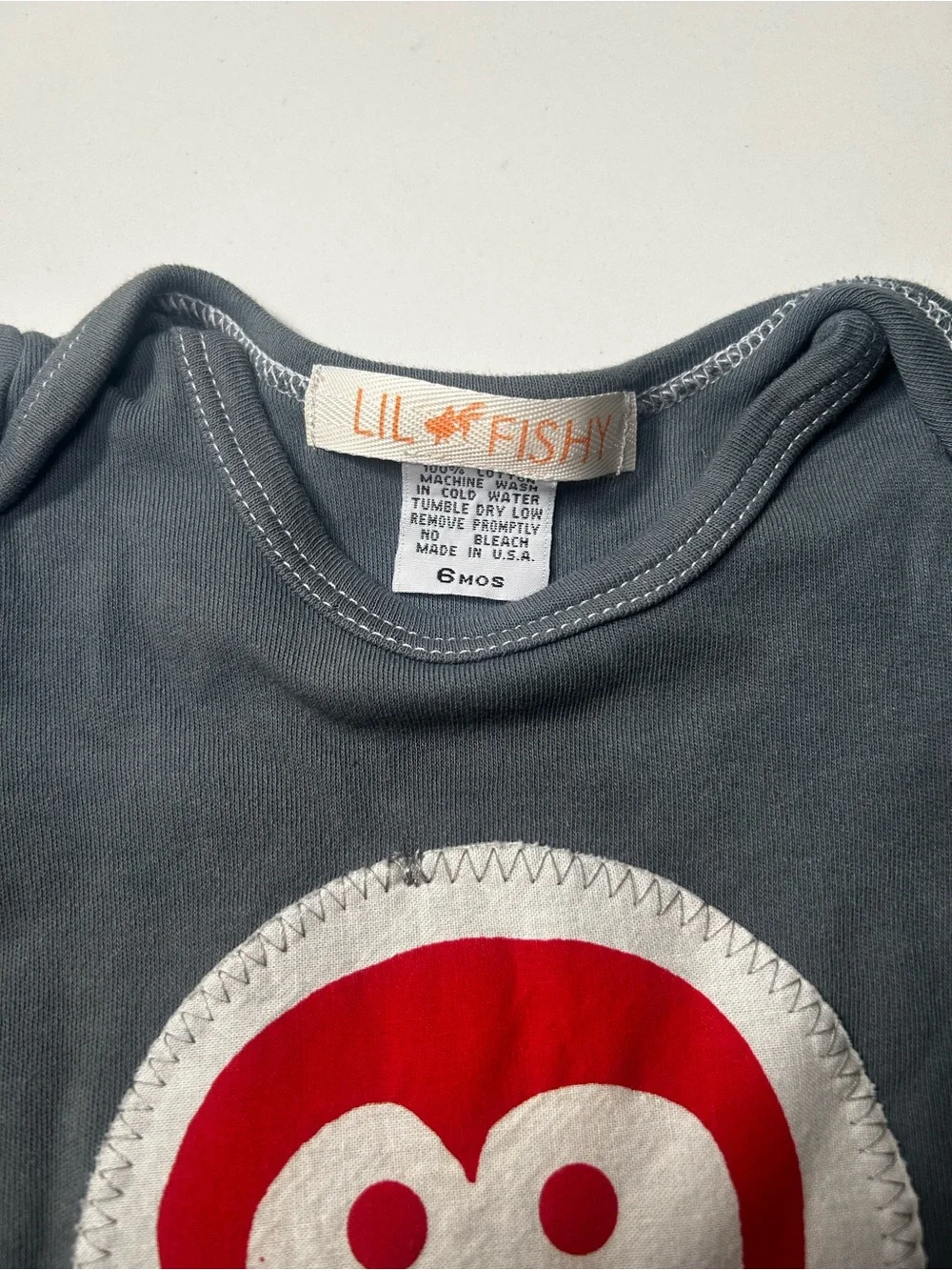 Lil Fishy Charcoal Baby One-Piece with Red Monkey Patch